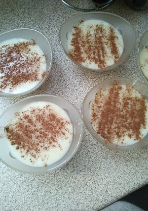 A picture of Rice Pudding with Fresh Goat Milk.
