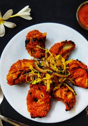 A picture of Tandoori Achari Momos.