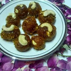 A picture of Mango coconut laddu.