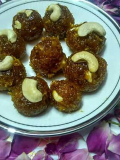 A picture of Mango coconut laddu.