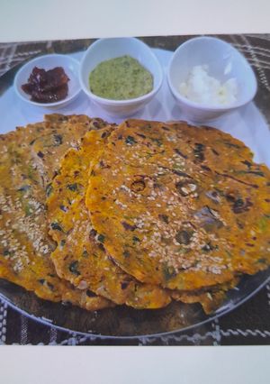 A picture of Thecha Thalipith - Mix Flour Flat Bread.