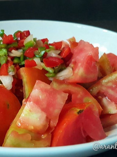 Una foto de Tomate aliñado