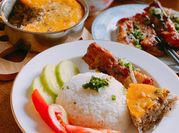 A picture of fried fish and rice