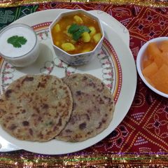 A picture of Rajgira aloo paratha with aloo ki sabji.