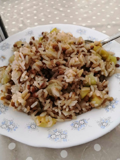 Una foto de Arroz, lentejas y calabacín
