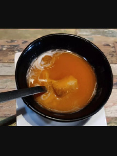 A picture of Carrot & tomato soup with fresh cream.
