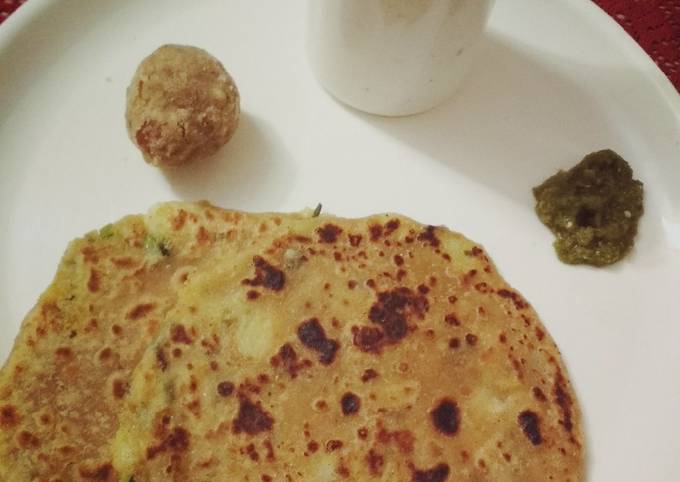 Aloo paratha with buttermilk and dry fruit ladoo