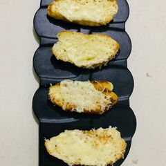 A picture of Cheese garlic bread.