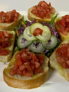 Una foto de Spiedino con pomodoro e origano