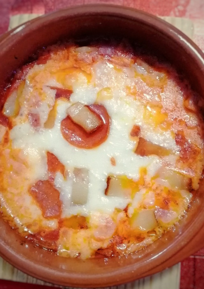 Una foto de Mozzarella al horno con bacon y peperoni