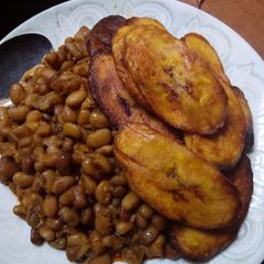 A picture of Beans and fried plantain.