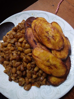 A picture of Beans and fried plantain.