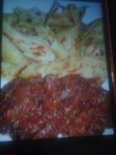 A picture of Chapati and beef stew.
