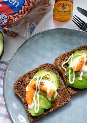 A picture of Avo and Poached Egg on Rye Bread Toast.