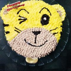 A picture of Pineapple flavour teddy cake.