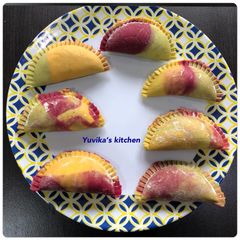 Three coloured Gujiya A picture of Three coloured Gujiya.
