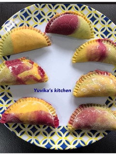 A picture of Three coloured Gujiya.