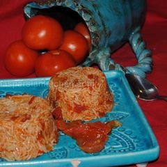 A picture of Persian tomato rice (Dami-e Gojeh Farangi).