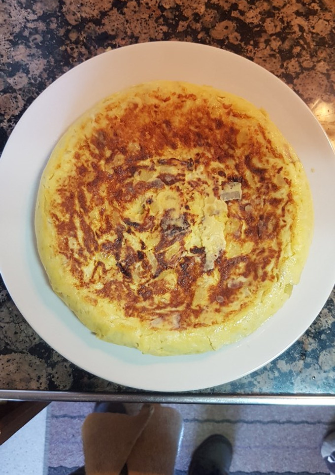 Una foto de Tortilla de patatas con cebolla