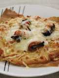 Pizzetas de mejillones y puerros