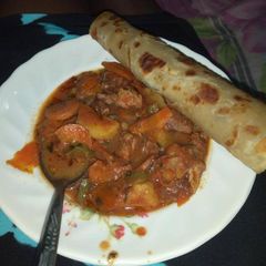A picture of Beef stew served with chapati# authormarathon#.