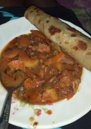 A picture of Beef stew served with chapati# authormarathon#.