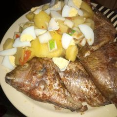 A picture of Grilled 🐠 garnished with Irish and egg.