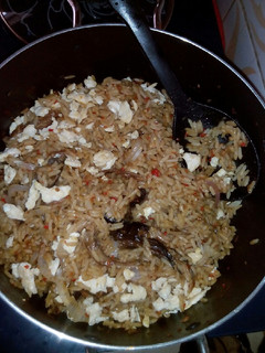 A picture of Brown rice with scramble egg.