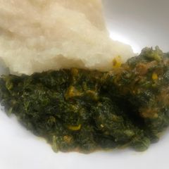 A picture of Vegetable soup and eba.