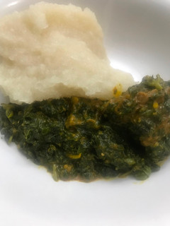 A picture of Vegetable soup and eba.