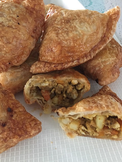 A picture of Airfried Chicken Curry Puffs using Store-bought Pratha Dough.