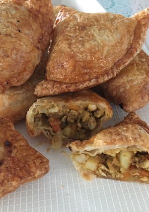 A picture of Airfried Chicken Curry Puffs using Store-bought Pratha Dough.