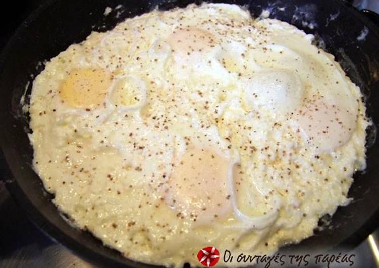 Eggs cooked with feta cheese