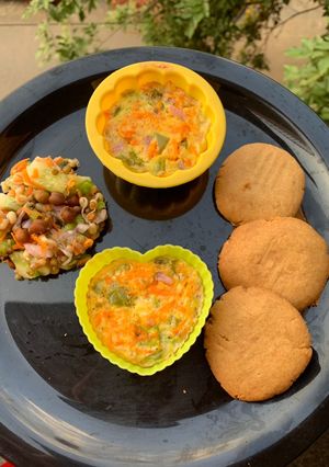 A picture of Egg muffin peanut butter cookies and brown chana sprout salad.