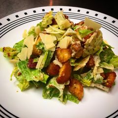 A picture of Caesar Salad, Dressing and Croutons.