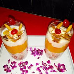 A picture of Milkshake with coffee and layer with mango jam.
