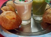 A picture of raw mango pani puri