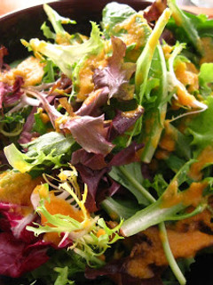A picture of Garden Salad with Miso Ginger Dressing.
