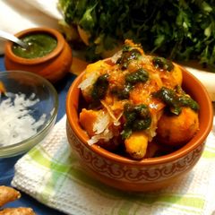 A picture of Ram ladoo with mint coriander chutney.