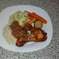 A picture of Honey glazed grilled chicken with brown rice.