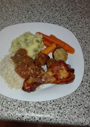 A picture of Honey glazed grilled chicken with brown rice.