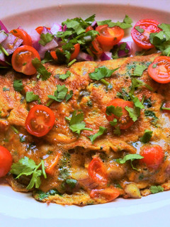Una foto de Tortilla Masala 🇮🇳