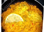 Una foto de arroz con pollo