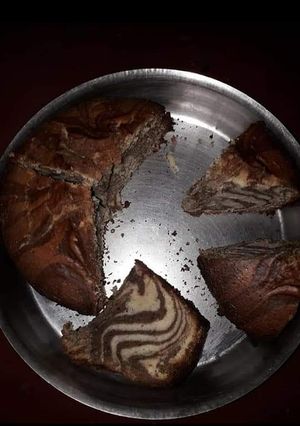 এগ লেস চকলেট জেব্রা কেক (egg less chocolate zebra cake recipe in Bengali) রেসিপির প্রধান ছবি