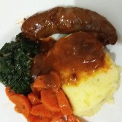 A picture of Sausage in a gravy.