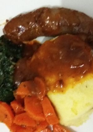 A picture of Sausage in a gravy.
