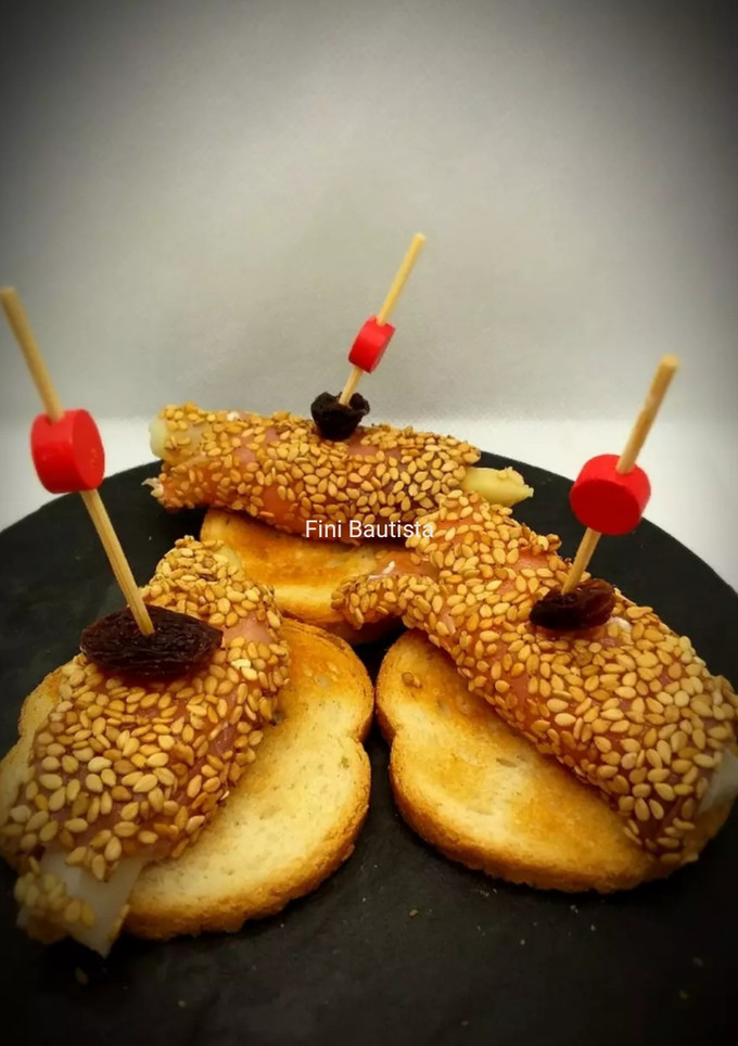 Una foto de Canapés de salmón ahumado y espárragos