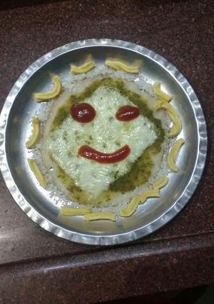 A picture of Cheese chutney uttpam.