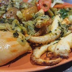 A picture of Grilled Octopus and Potatoes.