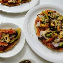 A picture of Paneer veggies Pizza.